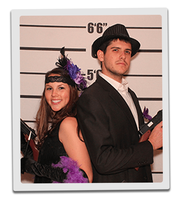 Chicago Murder Mystery party guests pose for mugshots