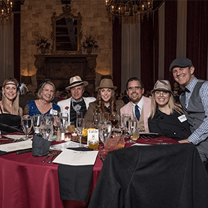 Chicago Murder Mystery party guests at the table